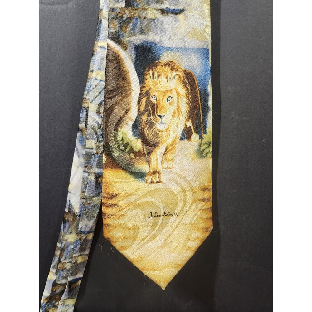 "Soul Winning Ties" necktie features a blue and tan abstract pattern.